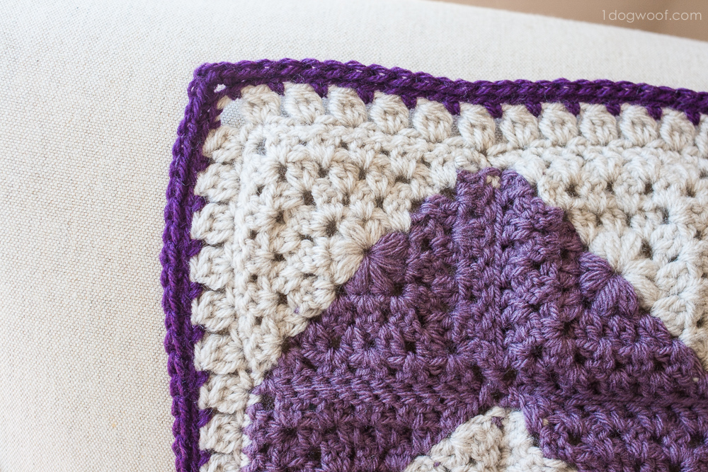See how to make this unique chevron afghan using granny squares! | www.1dogwoof.com