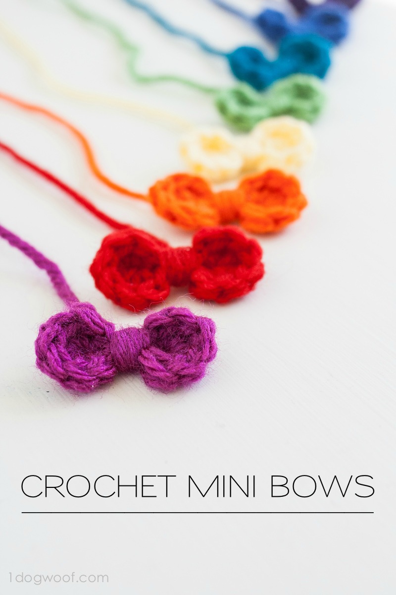 I crocheted a rainbow of these sweet mini bows in about half an hour. They'd make great embellishments to hair clips or clothing. | www.1dogwoof.com