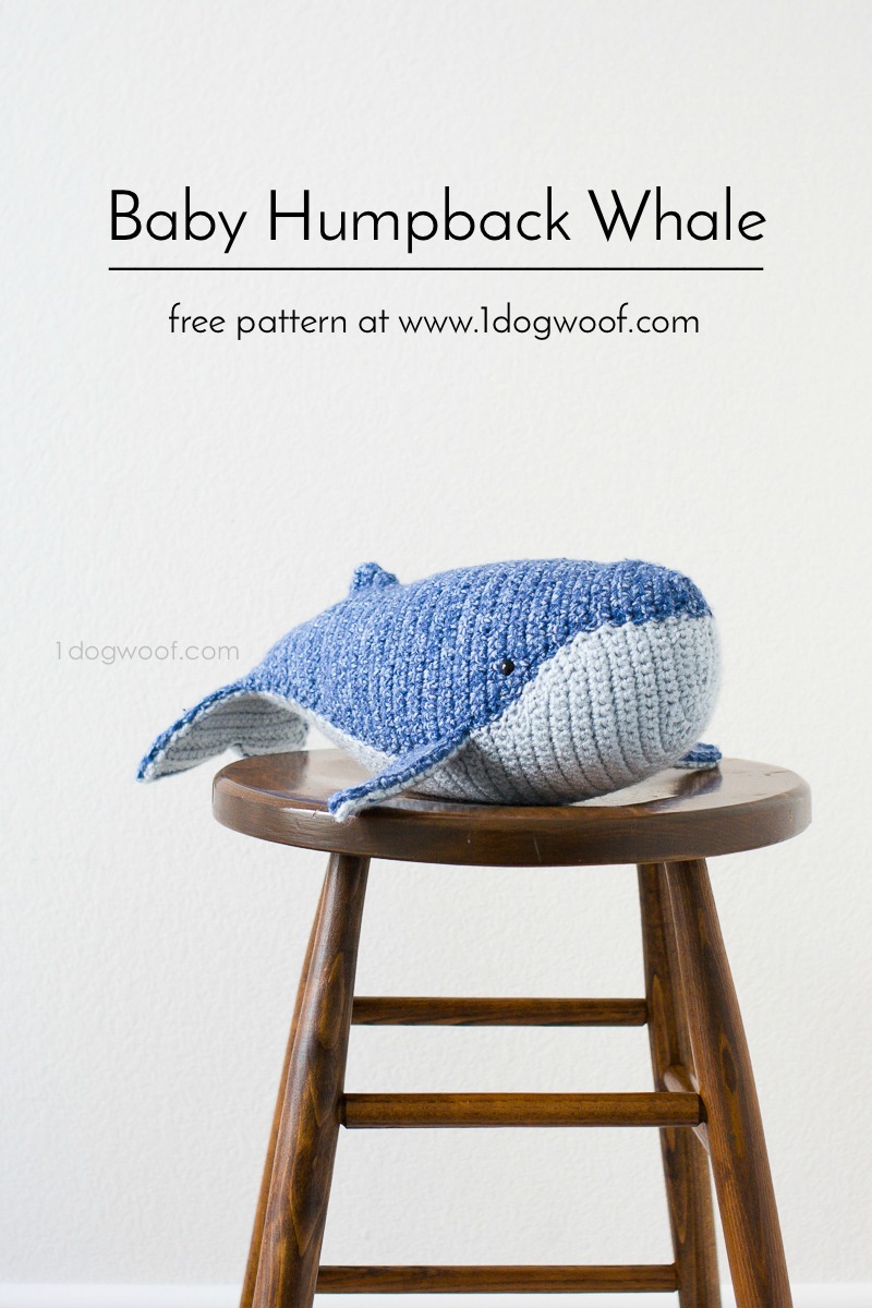 Crochet humpback whale sitting on stool