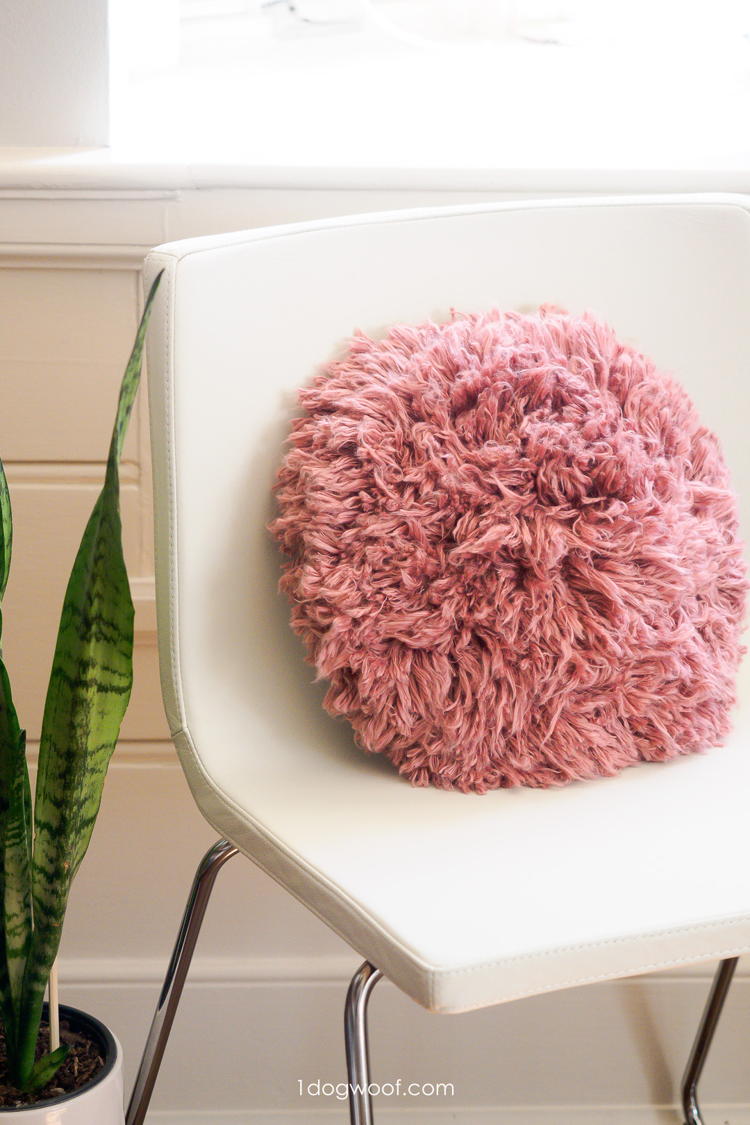 isla shag crochet pillow on white chair