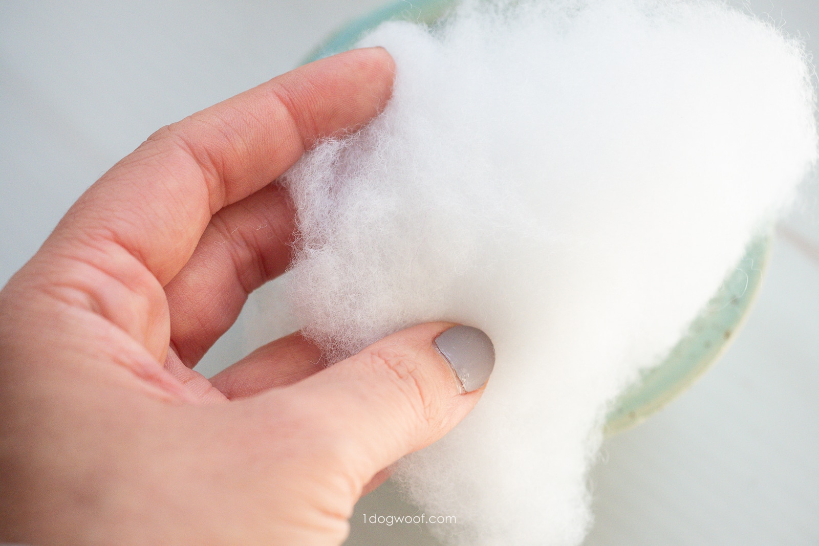 Sample of polyester fiberfill in left hand